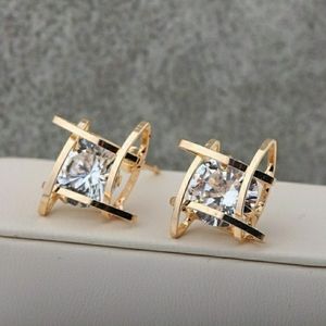 Round Solitaire Diamond Gold Caged Earrings